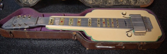 A Vox Humana lapsteel from roughly the same time. Note how much aluminium and plastics are used for inlays.